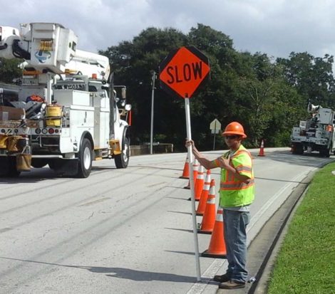 Man with slow sign